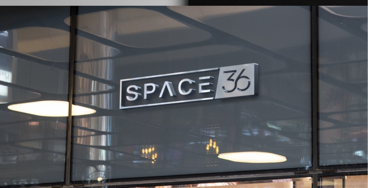 Space 36 sign on the window of the Brackley workspace